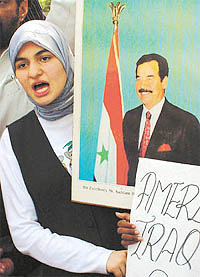 Arab students protest outside the UN office in the Capital, calling for an end to American threats against Iraq, Iran and North Korea.