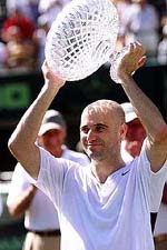 Andre Agassi celebrates his win over Roger Federer of Switzerland in the men's final of the Nasdaq-100 Open on Sunday
