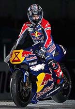 Australian MotoGP 500cc class rider Garry McCoy rides his new two-stroke MotoGP machine, the Yamaha's YZR500, during the opening ceremony of the Japanese Grand Prix at Suzuka circuit, central Japan, on Thursday. 