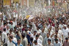 Residents of Vatva Arya shout slogans