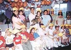 Jagjit Singh with the pre-school children at Stamford Childrens World.