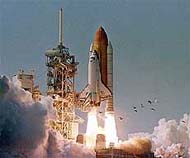 Space shuttle Atlantis lifts off from launch pad 39B