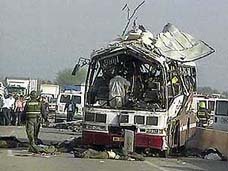 Bodies lie in front of a bus