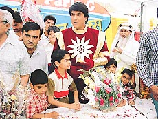 Shaktimaan, Mukesh Khanna with children at the Make your dream come true contest in Ludhiana on Wednesday.