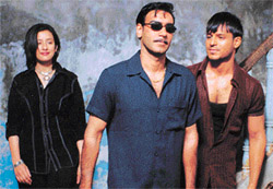 Manisha Koirala, Ajay Devgan and Vivek Oberoi star in Company.