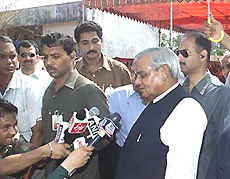 Prime Minister Atal Behari Vajpayee speaks to reporters 