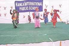 The kids of Kamla International performing a dance drama show.