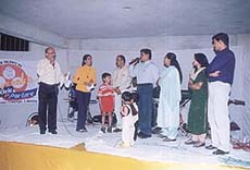 Parents and children participate in a talent show, organised by Rysssk’s Modele Portare at Noida.