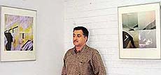 Prabhinder Lall with his paintings at an exhibition in Kalagram, Chandigarh, on Wednesday.