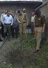 The Inspector General of Police inspects the site of explosion