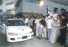 Delhi Chief Minister Sheila Dikshit flagging off the Delhi by Night Car Rally