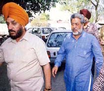Paramjit Singh, alias Pammi, being produced at a court