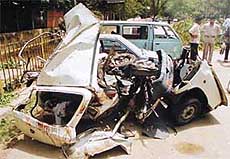 The mangled remains of the car