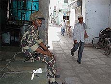 A student walks past a jawan