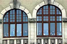 Students look out of a window