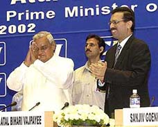 Prime Minister Atal Behari Vajpayee gestures as he arrives at the National Conference and Annual Session of CII