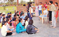 Students of Ajit Karam Singh International School, Sector 40, attend North Zone Cultural Centres childrens theatre workshop being organised at Kala Gram.