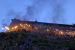 A view of a torchlight procession by villagers