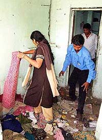 Volunteers of an NGO from Bihar clean a house