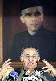 Pakistan Information Minister Nisar Memon speaks at a news conference