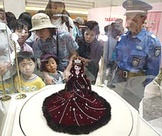 People crowd to look at "Lica-chan" doll