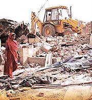 Jhuggis demolished in Shakarpur to pave the way for the construction of a road from Noida to Vikas Marg in the Capital.