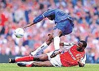 Arsenal man of the match Patrick Vieira  tackles Chelsea's Marcel Desailly
