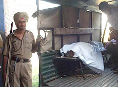 The bodies of old couple being taken for post mortem