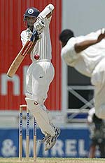 Rahul Dravid fends off a delivery from Adam Sanford during the fourth Test match between India and the West Indies at the Antigua Recreation Grounds in St Johns, Antigua on Friday.
