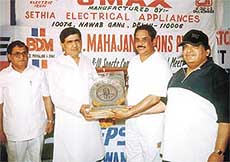 Kanwar Karan Singh, MLA  presenting the Dewan Chaman Lal Katyal Memorial Cricket Trophy