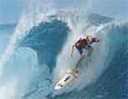 Hawaiian Keala Kennelly surfs to capture the Billabong Pro title in Teahupoo