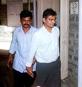 The tainted stockbroker Ketan Parekh being produced at a local court