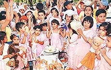 Tinytots of Blue Bird Model School celebrate Doll’s Birthday Party at the Sukhna Lake in Chandigarh on Friday.