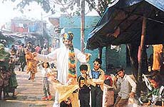 Bala Bhat, a puppeteer, practising in the colony
