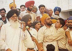 Mr Parkash Singh Badal, former Chief Minister of Punjab, addresses mourners after the cremation of Akali leader
