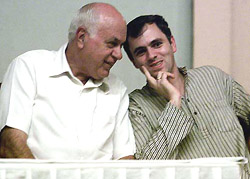 Jammu and Kashmir Chief Minister Farooq Abdullah shares a smile with his son