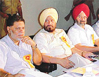 Mr S.K. Sivia, Fellow, Institute of Engineers, Mr Amarjit Singh Samra, Minister of State for Agriculture and Revenue, and Dr K.S. Aulakh, Vice-Chancellor, PAU