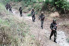 Army jawans patrol near the Indo-Pak border