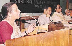 Mrs Bhuvan Chandel (left) addresses at seminar on "Science, society, values and consciousness" at ICSSR seminar complex in Panjab University, Chandigarh, on Monday.