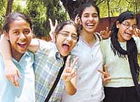 Students of Class X celebrate after the declaration of the CBSE results in the Capital on Tuesday.