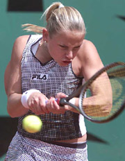 Jelena Dokic of Yougoslavia returns a backhand to Emmanuelle Gagliardi of Switzerland