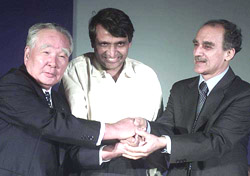 Union Minister of Power and Heavy Industries Suresh Prabhu and Union Minister for Disinvestment Arun Shourie with Suzuki Motors Chairman