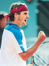 Arnaud Clement of France rejoices after winning the second set