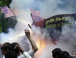 All-India Youth Sikh Forum activists burn the replica of a Pakistani missile