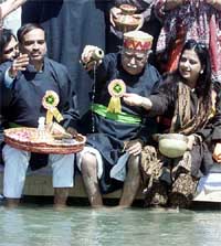 Union Home Minister L. K. Advani pours the holy water into the Sindhu river