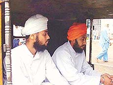 Two of the five accused being taken to a police station in Ludhiana on Saturday.