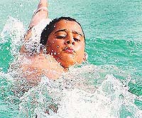 Nikhil Sunil who won a gold medal in the Group IV (50m) event of the District Sub-junior and Junior Swimming Championship in Ludhiana on Saturday.