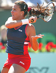 Jennifer Capriati of the USA returns a volley to Evie Dominikovic of Australia during the French Open on Saturday.