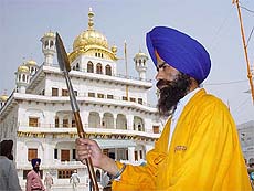 A 'sewadar' keeps a vigil