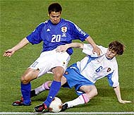 Russias Igor Semshov challenges Japans Tomokazu Myojin
